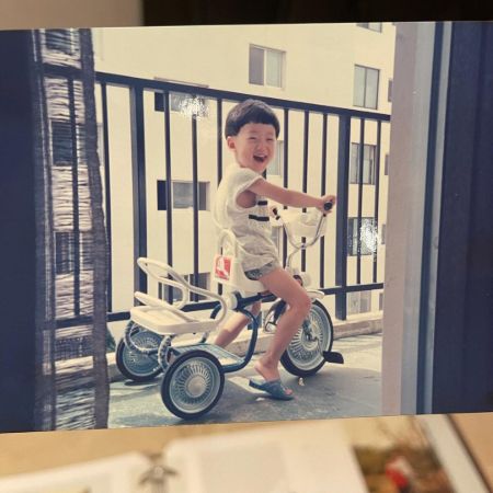 Choi Jin Hyuk riding his toy cycle, When he was 4 years old.